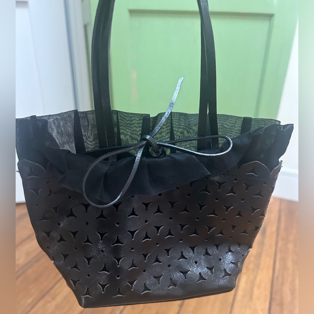 DKNY leather eyelet and chiffon evening bag. EUC